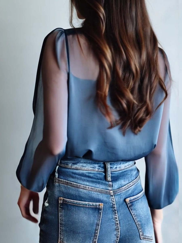 Relaxed fit women's blouse with a beautiful boho floral print, easy wear style.