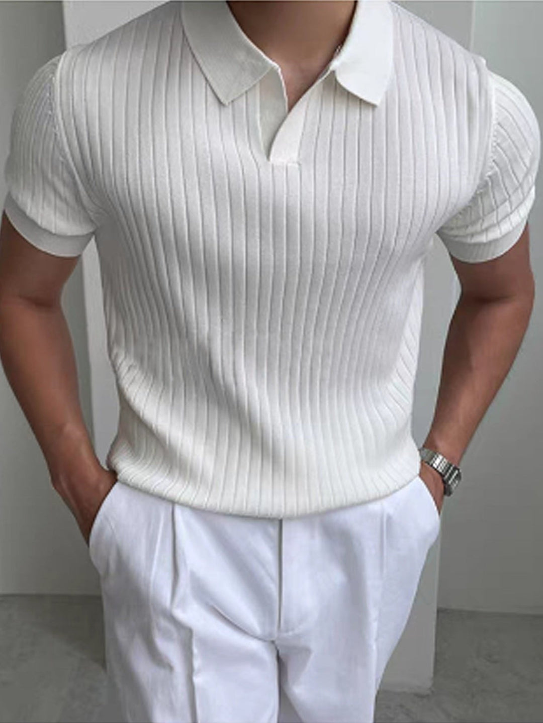 Men's refined ribbed polo shirt in a tailored fit for smart casual style and comfort.