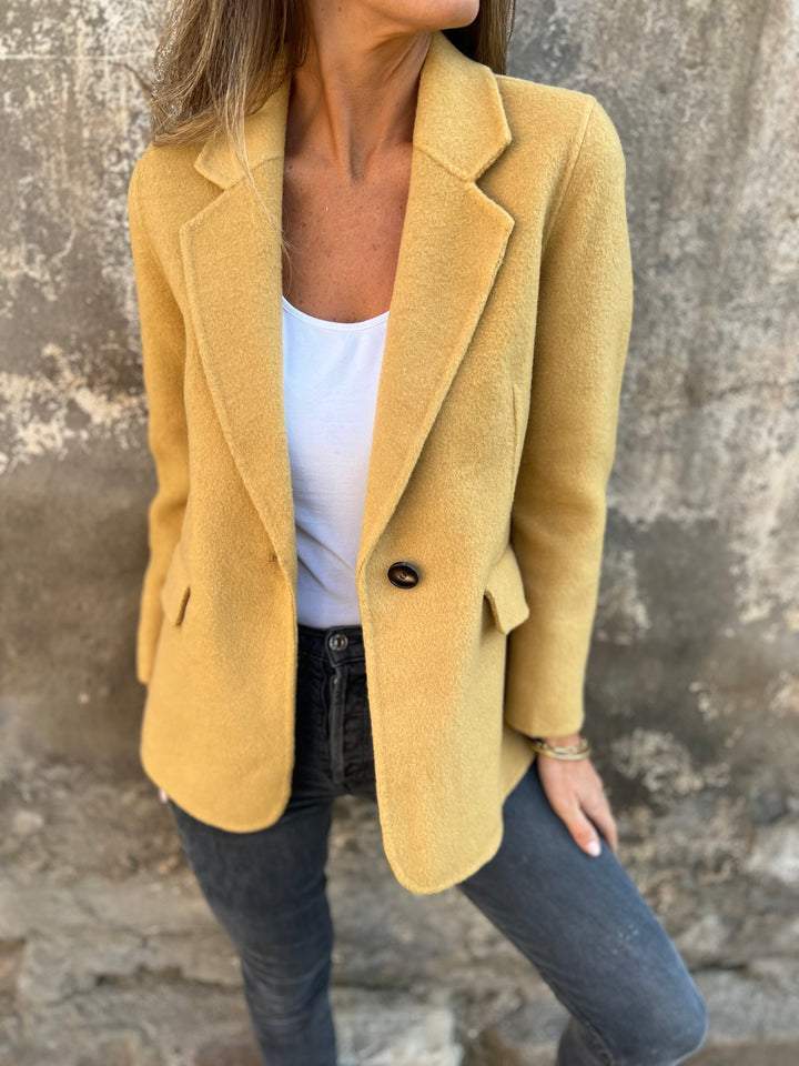 Premium women's tailored blazer. Elegant professional jacket, perfect for office attire & versatile smart casual looks.