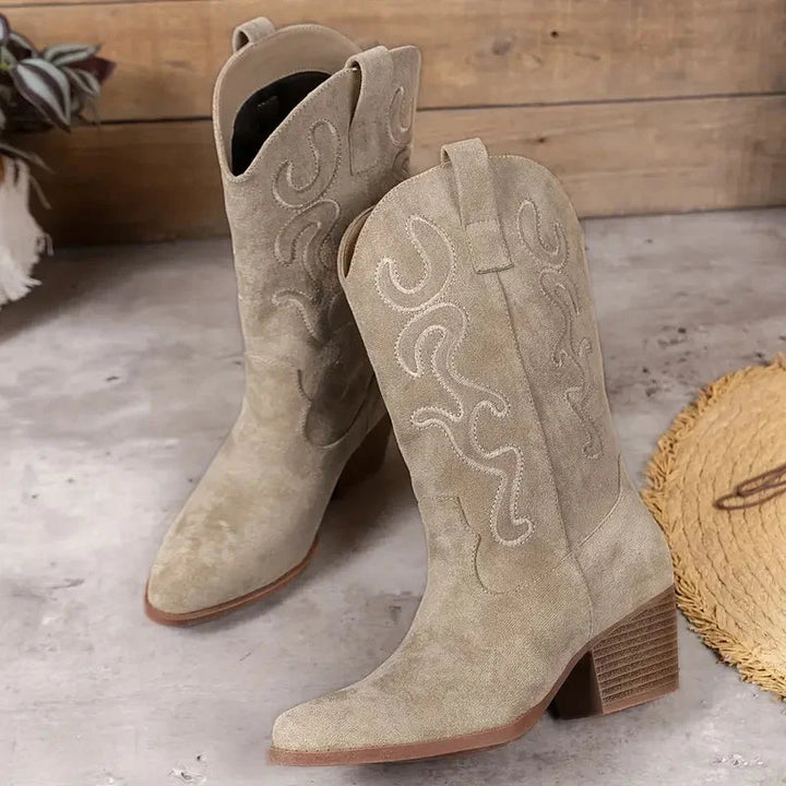 Stylish women's pull-on ankle cowboy boots with elegant western stitching, ideal for fashion and daily wear.