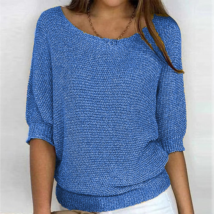 Fashionable women's long sleeve batwing sweater. Oversized and cozy for stylish fall & winter outfits.