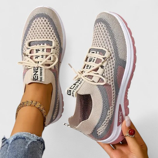 Black women's casual walking sneakers, lightweight with supportive cushioning for daily comfort.