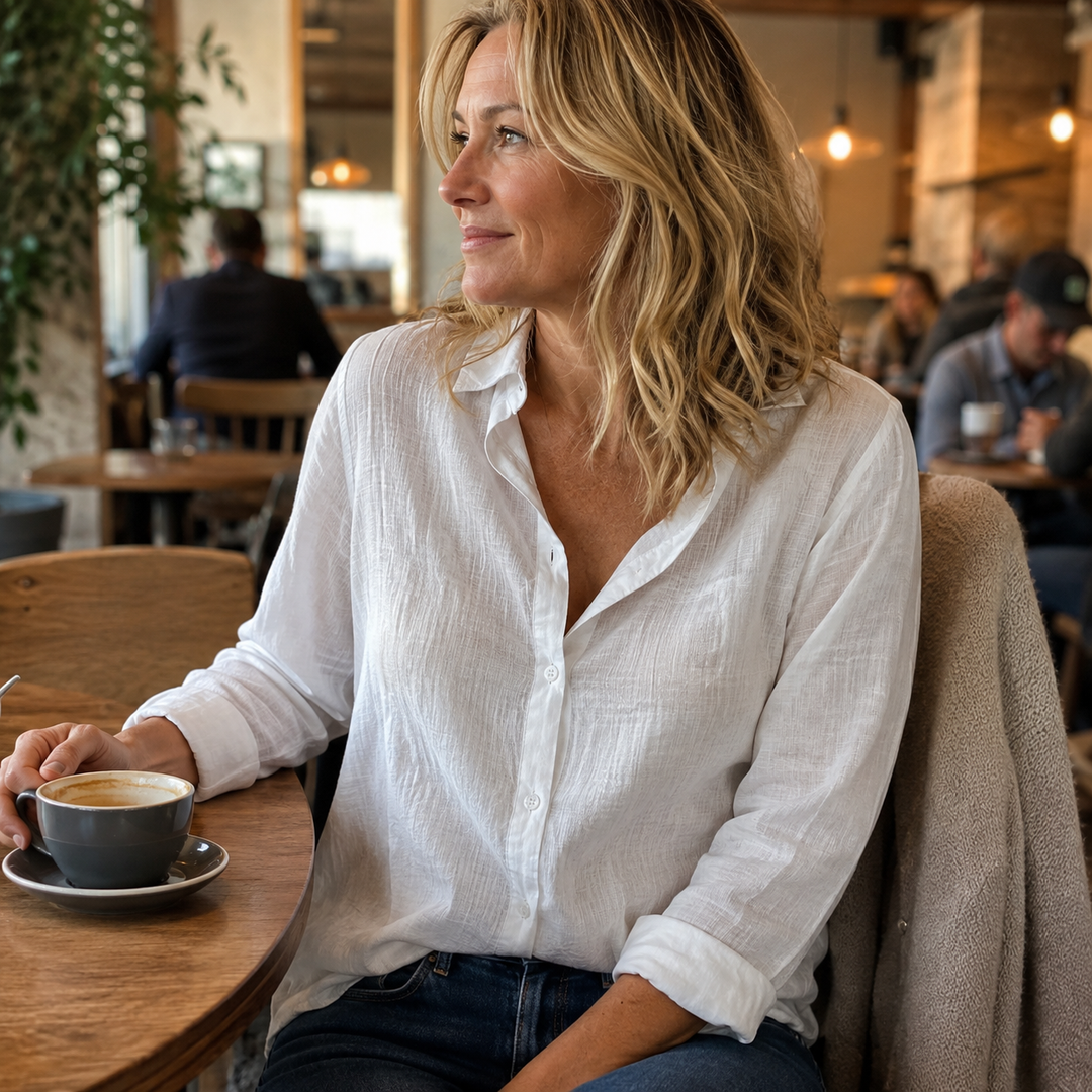 Versatile women's button-down shirt, long sleeve collared top for everyday fashion, professional or casual.