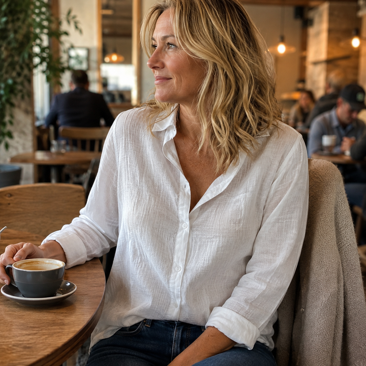 Versatile women's button-down shirt, long sleeve collared top for everyday fashion, professional or casual.