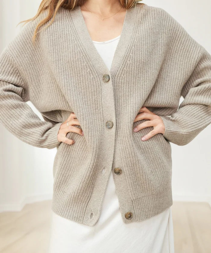 Back view of a women's relaxed fit knit cardigan vest in a versatile khaki color.