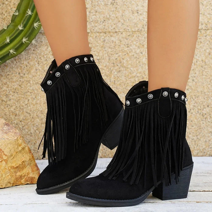 Women's wide-calf western cowboy boots with fringe & block heel. Stylish for fall fashion & casual wear.