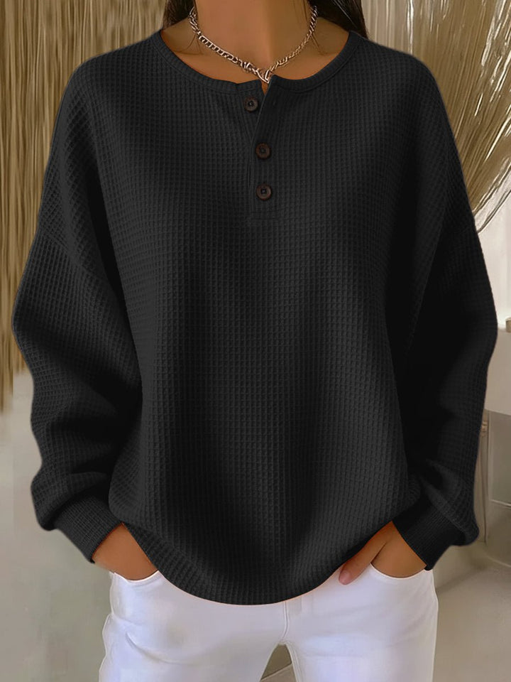 Stylish women's collared sweatshirt with long sleeves for a cozy, casual, and relaxed look.