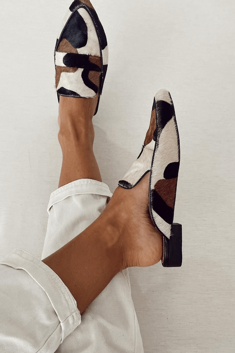 Versatile women's animal print slip-on loafers, offering comfort and style for everyday wear. Statement shoes.