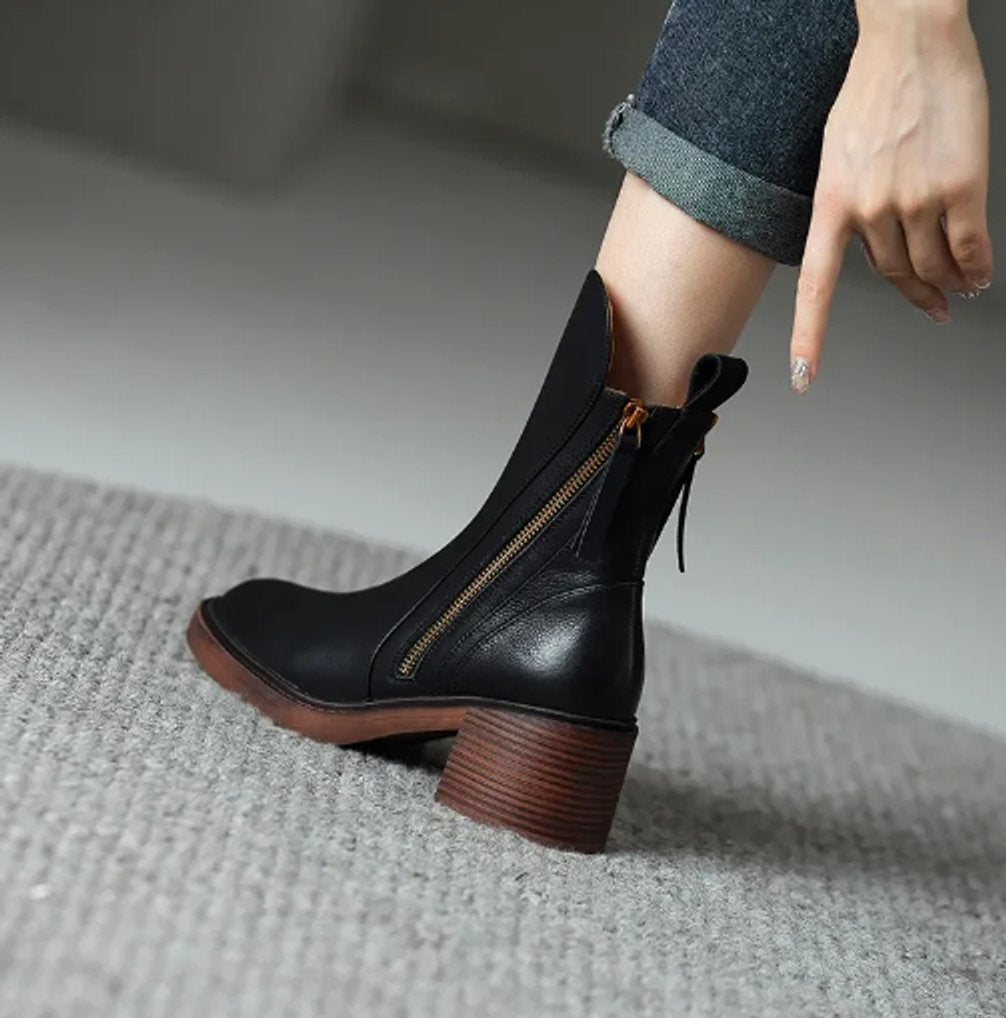 Comfortable and elegant women's side-zip ankle boots with a stylish block heel, ideal for daily fashion.