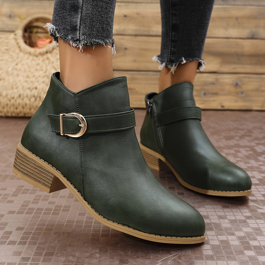 Women's brown Chelsea boots, ankle height, with a fashionable modern buckle, round toe, and everyday comfort.