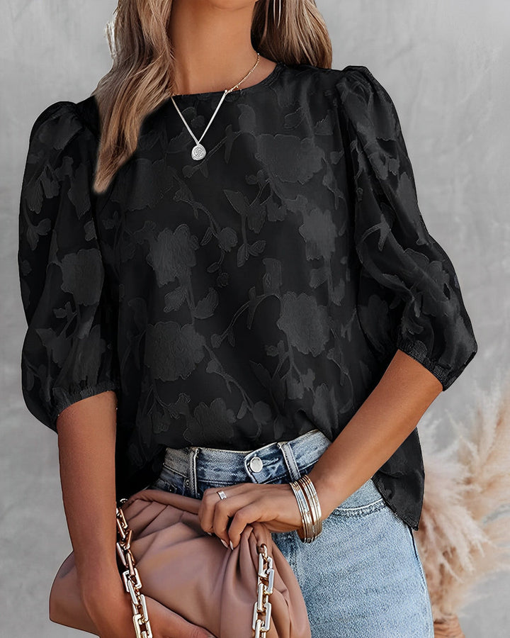 Elegant women's blouse with puff sleeves, a versatile long sleeve top perfect for casual to formal fashion.