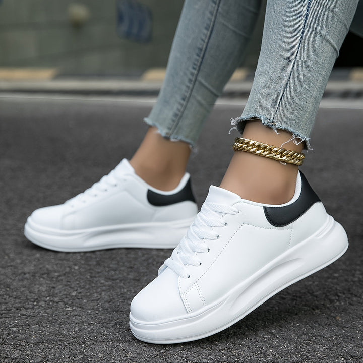 Ergonomic women's sneakers featuring arch support and plush cushioning for support.