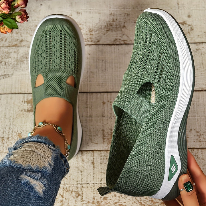 Beige women's slip-on casual shoes with cushioned arch support, perfect for walking & everyday comfort.
