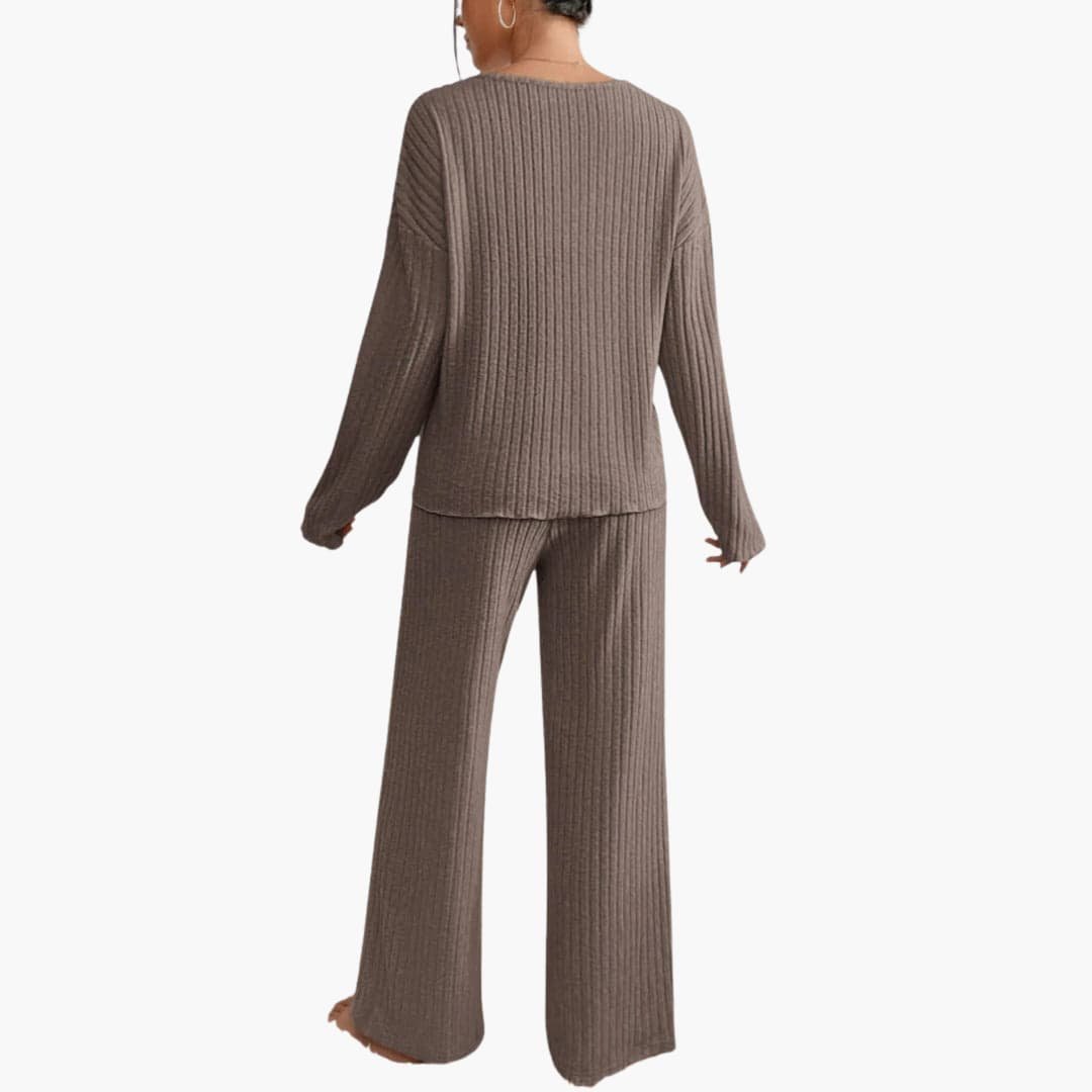 Stylish women's ribbed two-piece set for lounging. Elegant long sleeve top & straight leg pants.