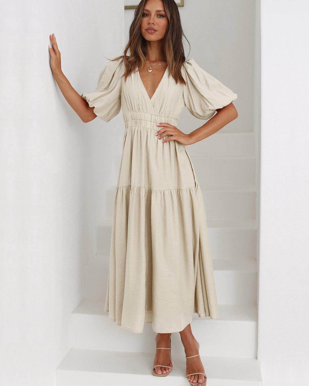 Chic women's elegant puff sleeve midi dress, perfect for sophisticated summer style.
