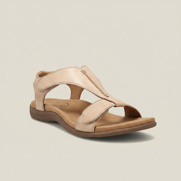 Women's T-strap orthopedic sandals with secure velcro closure and cushioned sole for comfort.