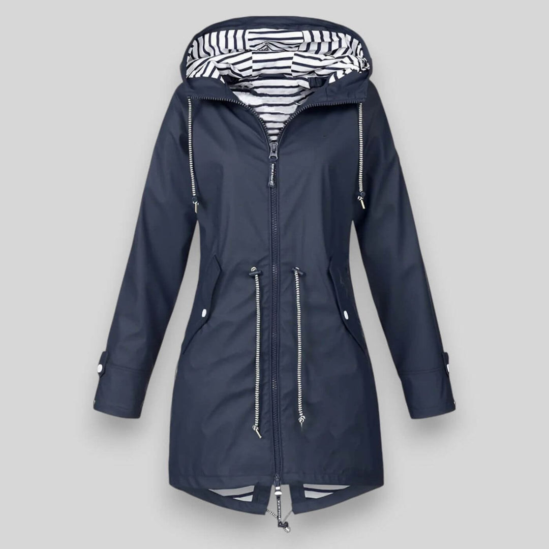 Women's lightweight waterproof rain jacket with hood, ideal for outdoor activities & travel.