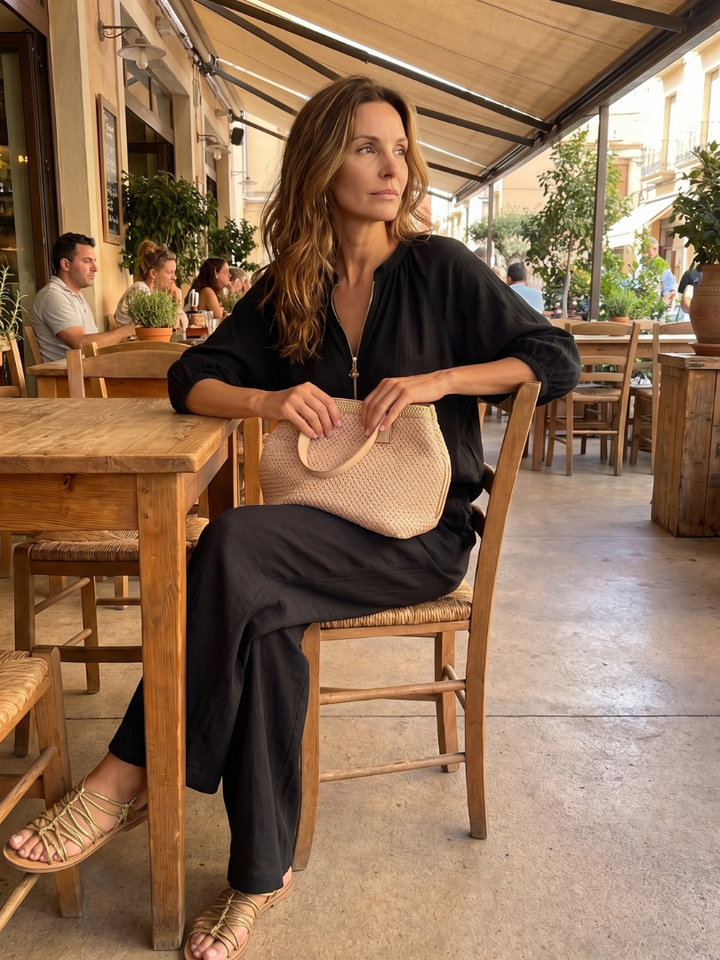 Stylish women's matching set: zip-front blouson top & wide-leg pants.