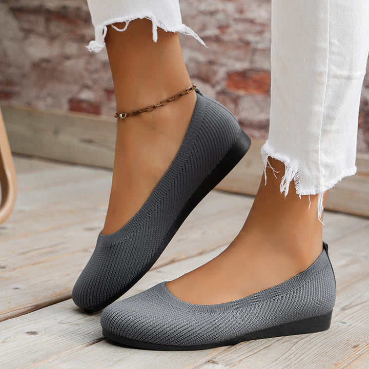 Secure non-slip women's sneakers, providing orthopedic arch support and breathable wide-fit design.