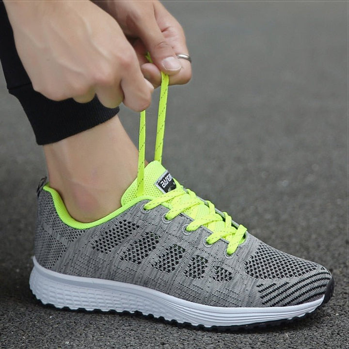 Women's orthopedic lace-up walking shoes in blue, engineered for comfort, support & an active lifestyle.