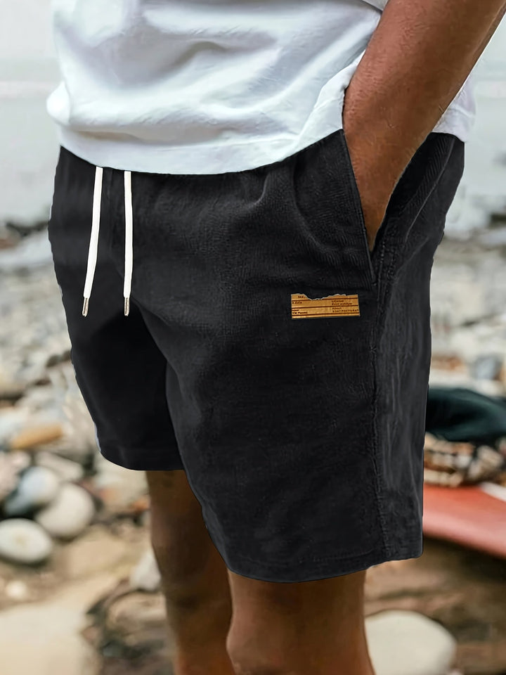 Black men's relaxed fit drawstring shorts, perfect for summer lounge & everyday style.