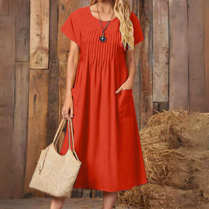 Versatile women's everyday midi dress with a relaxed fit, short sleeves, and pockets for ultimate comfort and style.