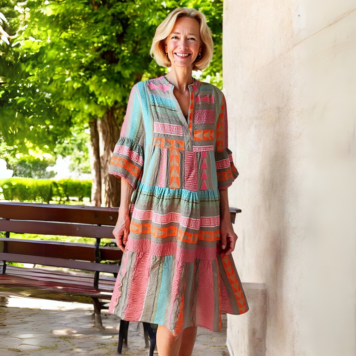 Beautiful pink A-line women's dress with elegant ruffles, perfect for spring events and feminine style.
