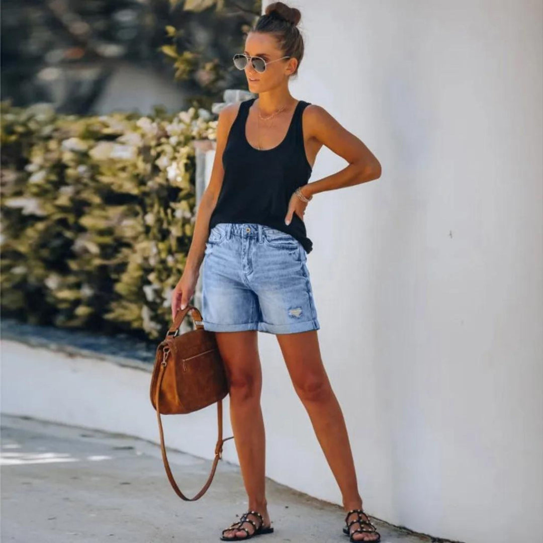 Effortless women's high-waisted blue shorts for summer fashion, combining elegant style & comfort wear. Vacation ready.