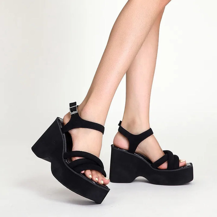 Stylish women's Carmela sandals, designed for bold elegance & superior comfort in black.