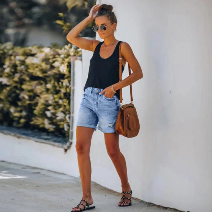 Casual chic women's high-waisted blue shorts, a stylish and comfortable choice for summer fashion & daytime outfits.