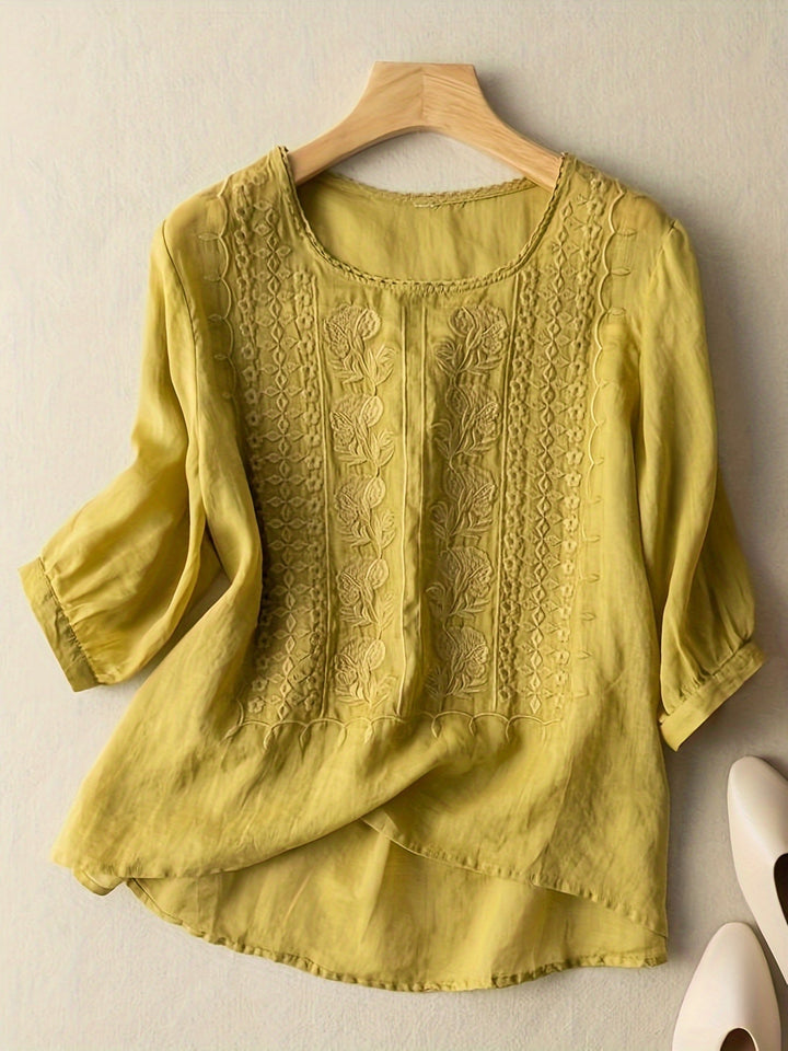 Fashionable women's embroidered blouse, relaxed fit tunic top, ideal for spring, summer & everyday style.