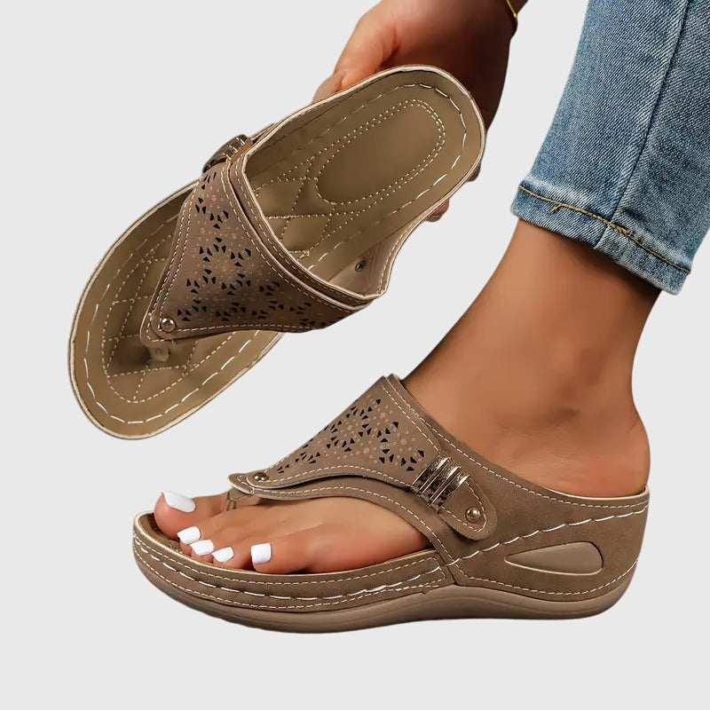 Black women's orthopedic sandals with arch support for comfortable summer walking and foot pain relief.