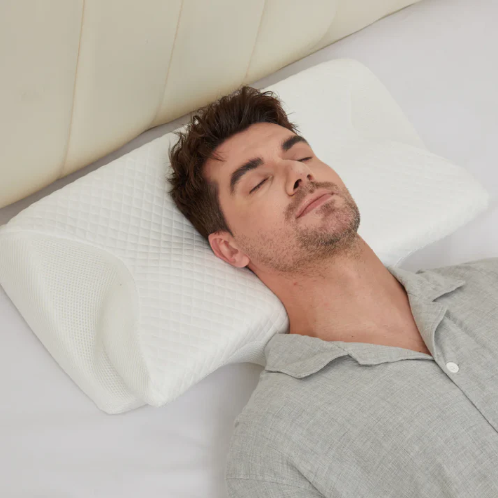 Washable anti-snoring memory foam pillow, designed for sleep apnoea and optimal neck support.