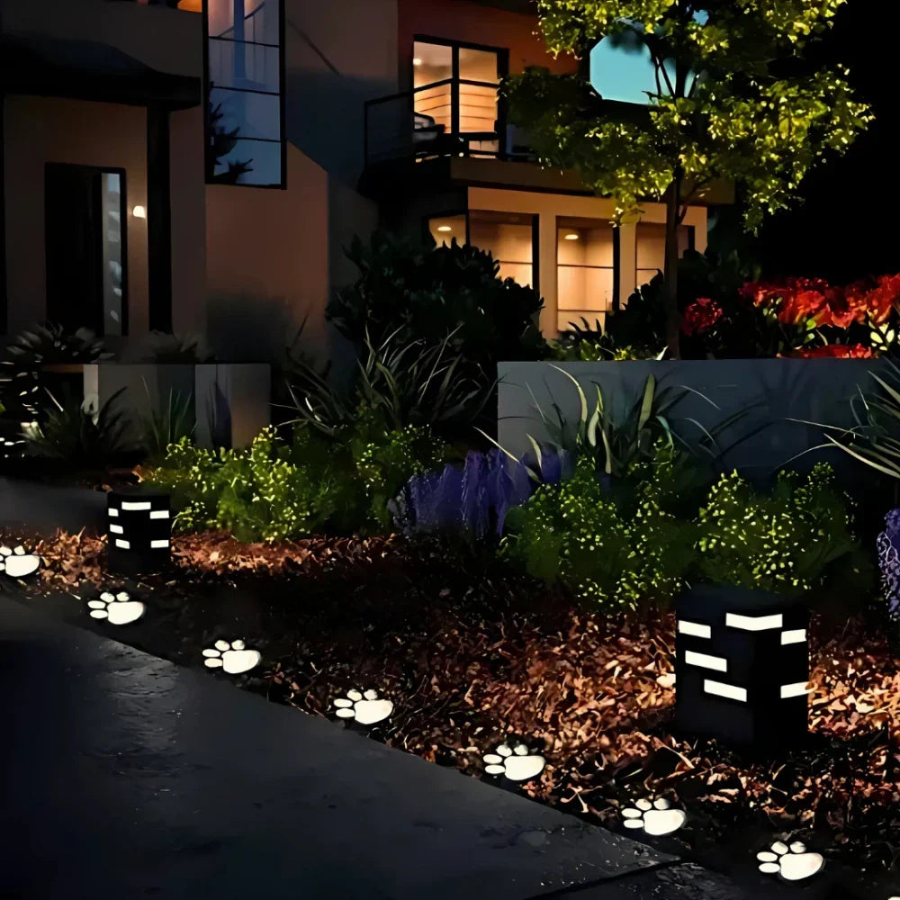 Waterproof paw print solar path lights, LED outdoor garden decor, automatic & energy-efficient.
