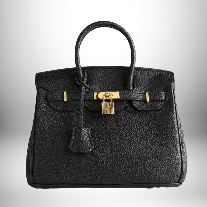 Elegant women's embossed leather handbag with chic gold accents, perfect for sophisticated style.