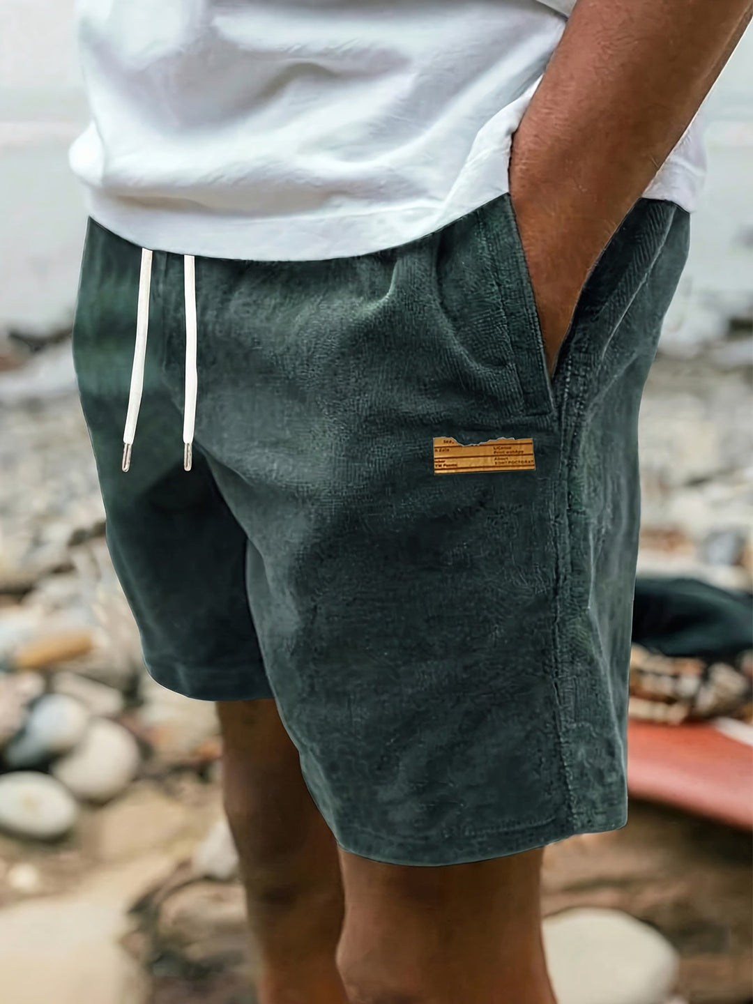 Dark gray casual men's drawstring shorts, relaxed fit ideal for comfortable lounging.