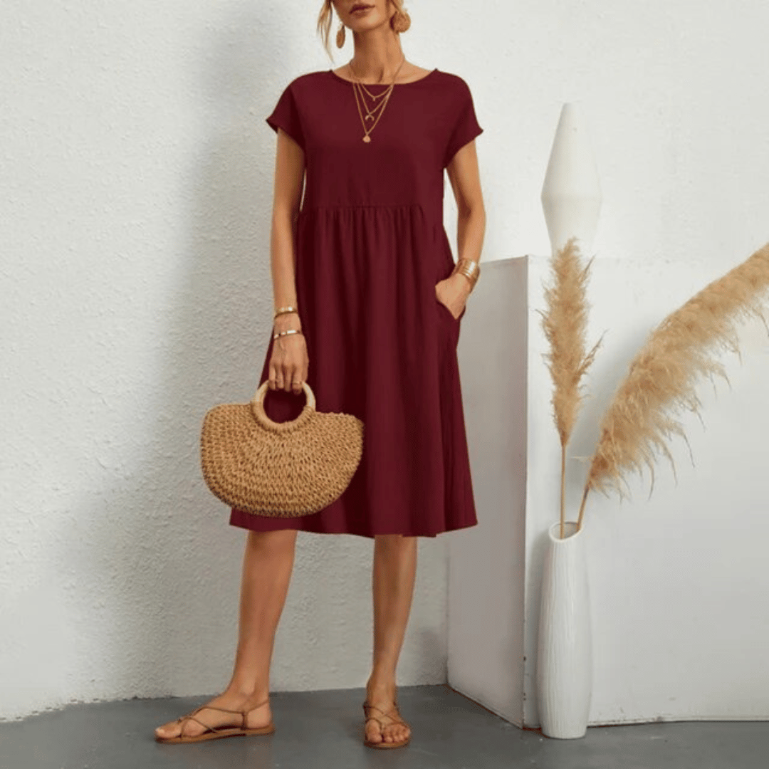 Sleeveless everyday women's dress, designed for a flattering fit with elegant tummy control.