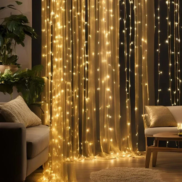 Ambiance-creating warm white LED fairy curtain lights, perfect for cozy indoor settings.