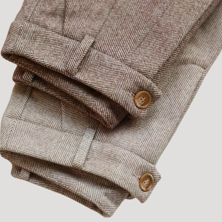 Gray men's modern tailored ankle-length trousers. Perfect for a modern office style or casual spring look.