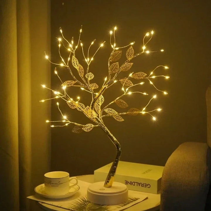 Warm white LED golden leaf bonsai lamp provides ambient lighting. Perfect decorative light for a cozy home atmosphere.