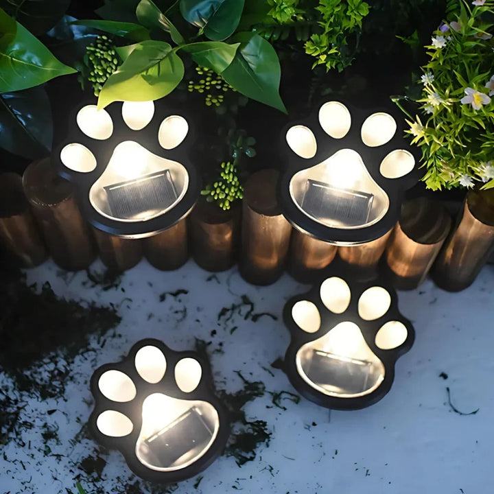 Durable waterproof paw print solar path lights, LED automatic for charming outdoor garden & yard decor.
