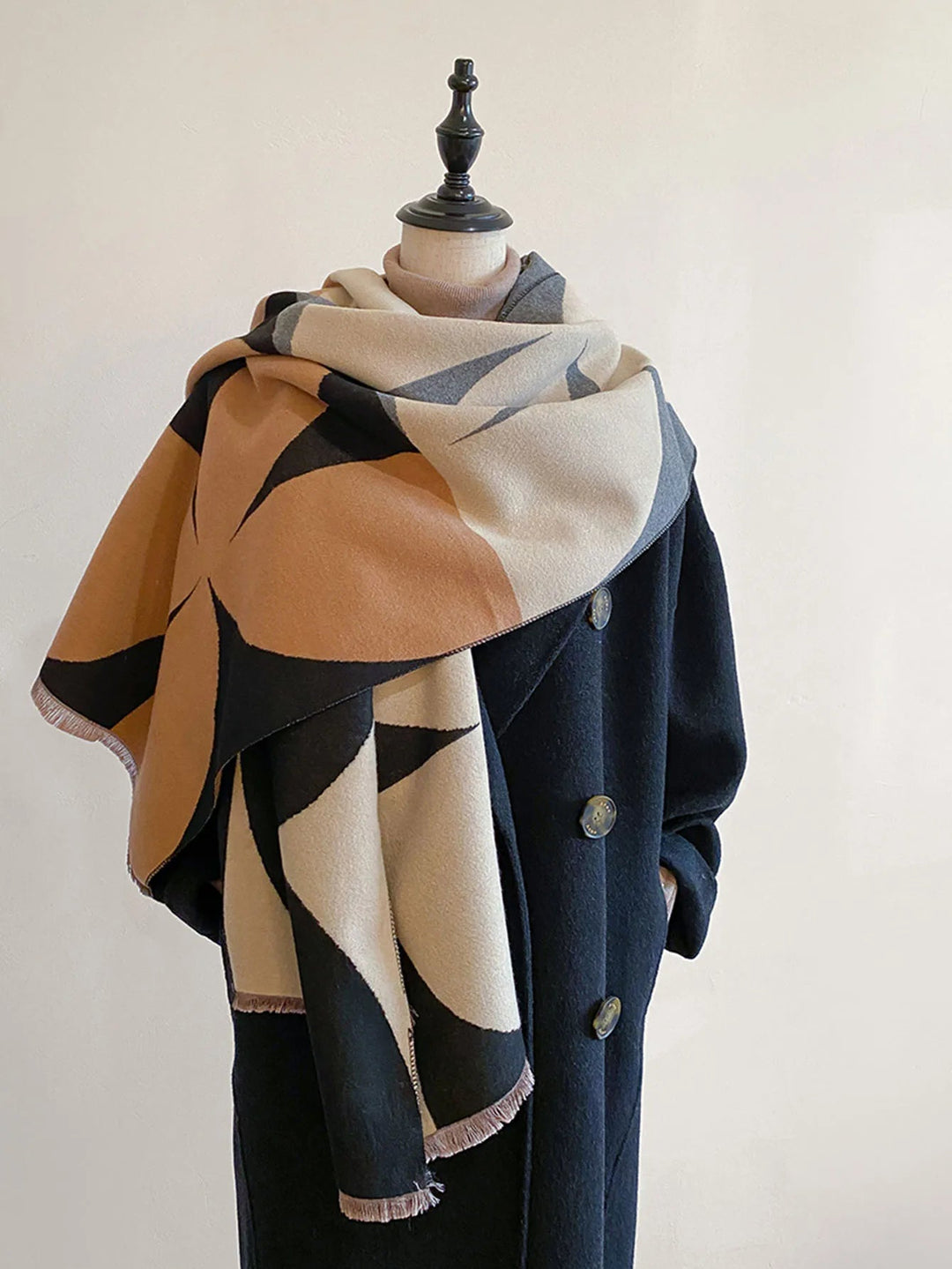 Elegant women's reversible cashmere wrap, soft two-tone design for warm winter accessory.