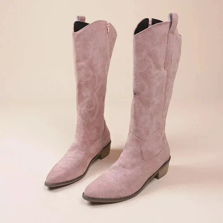 Versatile women's Western cowboy boots with intricate embroidery, pointed toe, & comfortable block heel.