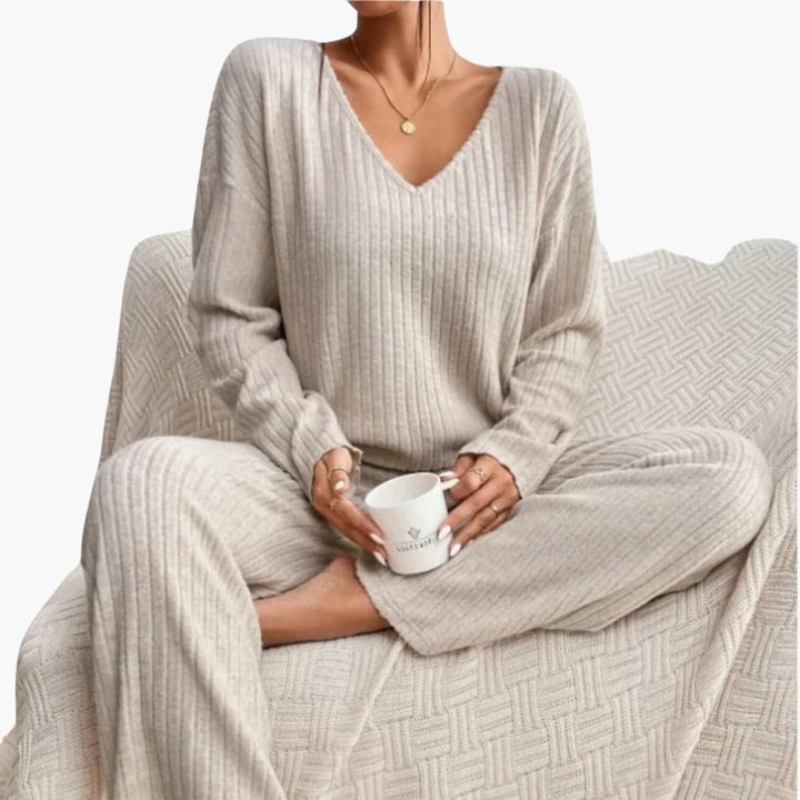 Women's minimalist ribbed loungewear set, featuring a long sleeve top & straight leg pants.