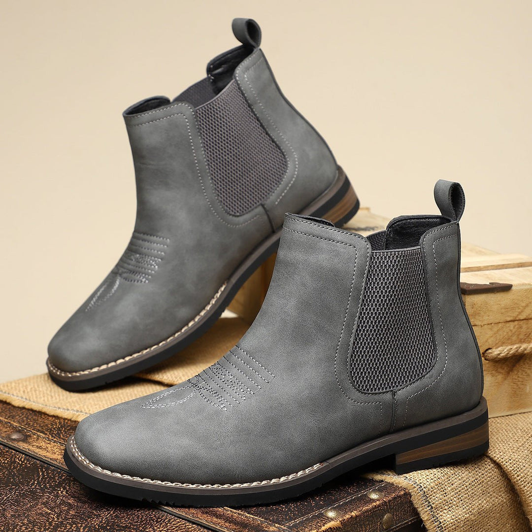 Durable men's slip-on ankle boots with a timeless Chelsea design. Perfect for both casual and dress footwear.