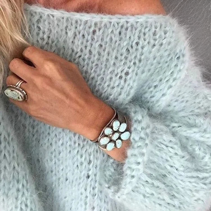 Soft women's winter knit sweater, a chic casual pullover top for comfortable wear and everyday fashion.