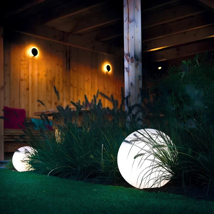 Elegant spherical RGB garden light, 16 colors, weatherproof, remote. Transforms any outdoor or indoor space.
