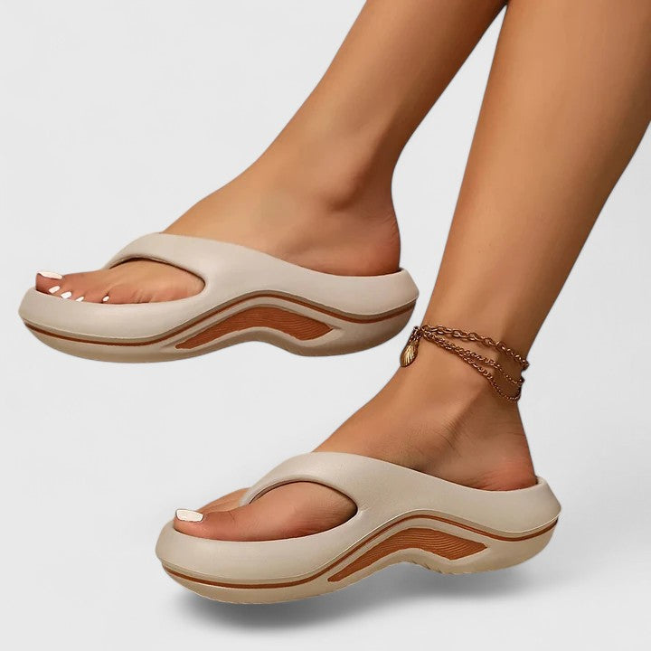 Women's everyday comfort slide sandals, designed to be lightweight slip-on footwear for casual outings.