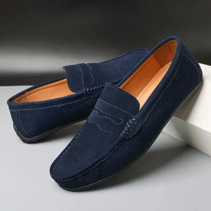 Comfortable red women's Stockholm loafers, versatile dress shoes for all-day wear with moccasin style.