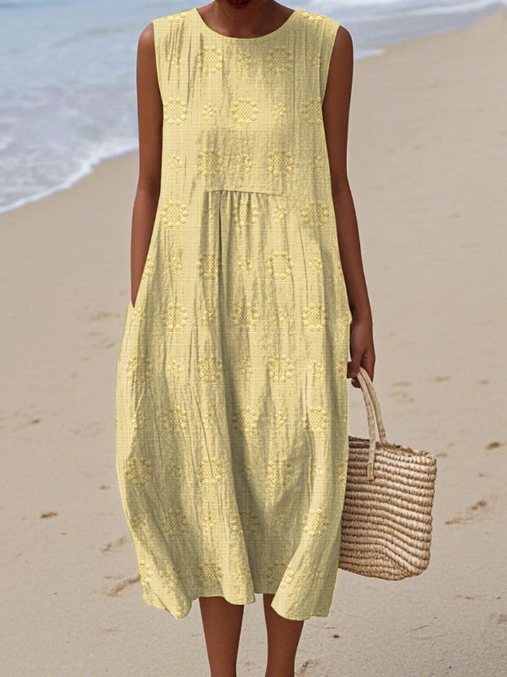 Women's elegant summer midi dress, showcasing beautiful embroidery and comfortable flow for spring fashion.